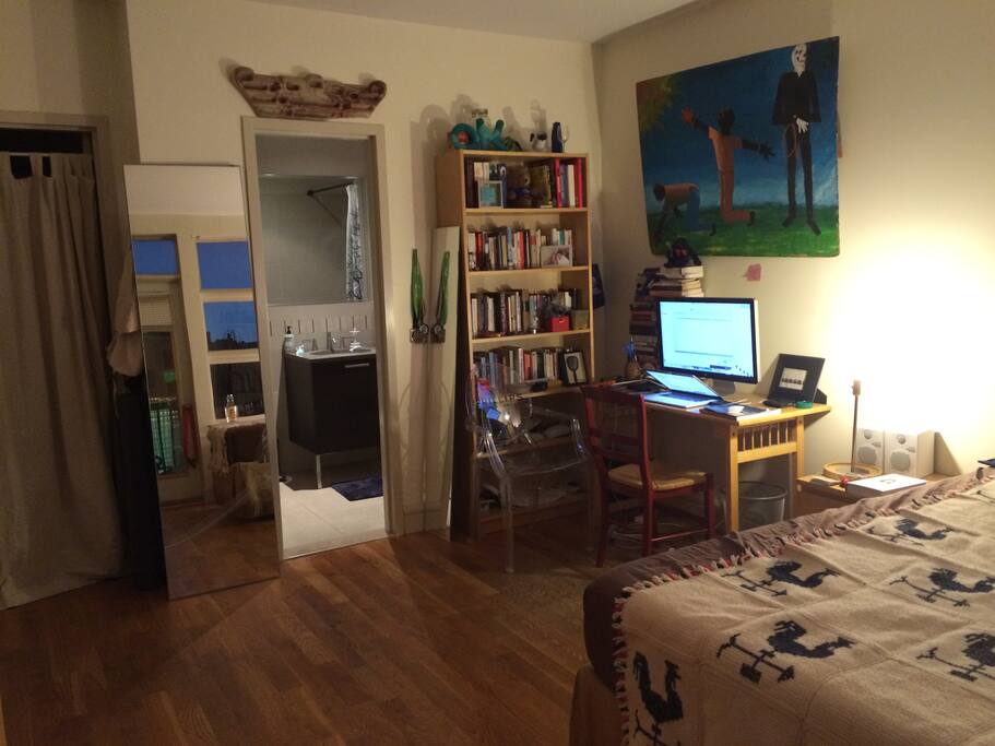 You will have access to the oversize Apple monitor for watching movies. Or the bookshelf full of books for reading!