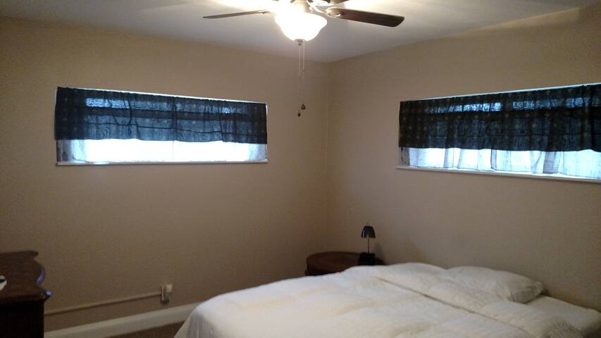 Comfortable room in serene waterfront home.