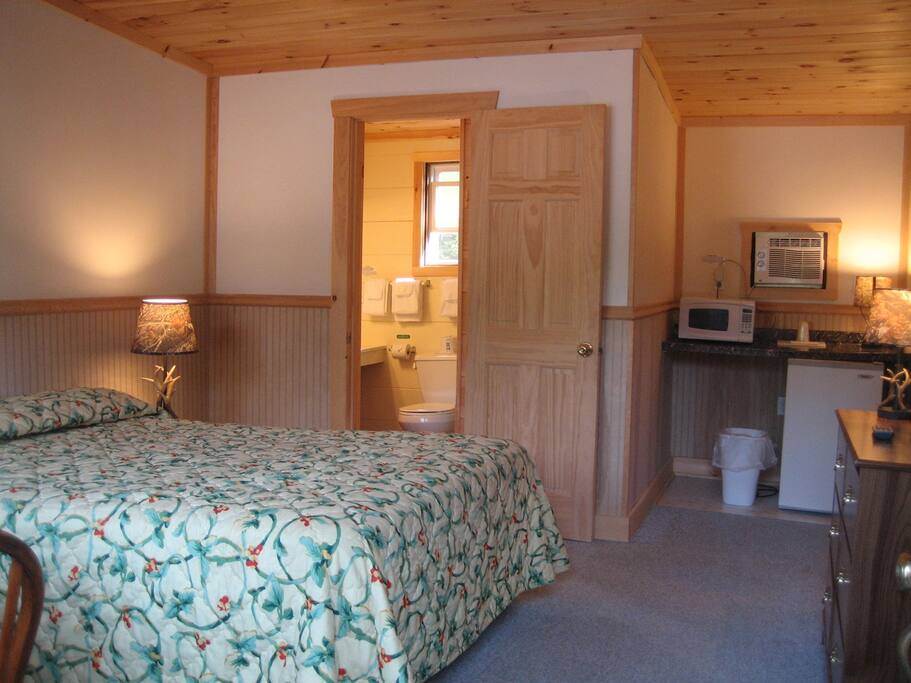 1 Qn. Bed, Flat Panel Color Cable TV, A/C, Heat, Microwave, Refrigerator, Free Wi-Fi, Privacy Porch, In-Room Sitting Area