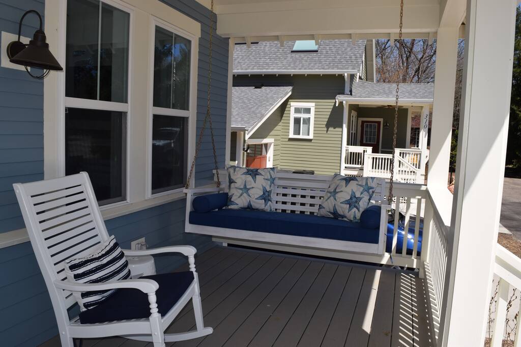 One side of front porch. Steps from heated pool.