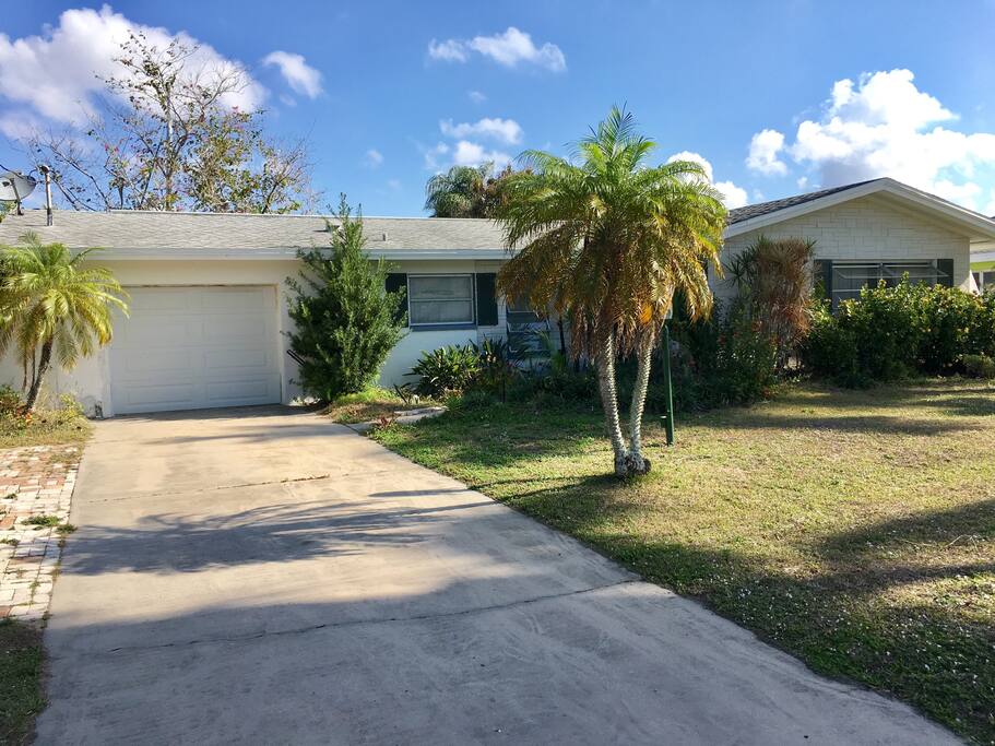 Three bedroom house with two bathrooms, kitchen, dining, and living room area.