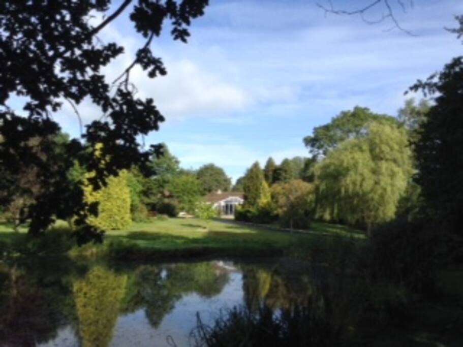 Georges stands in an acre of garden with duckpond