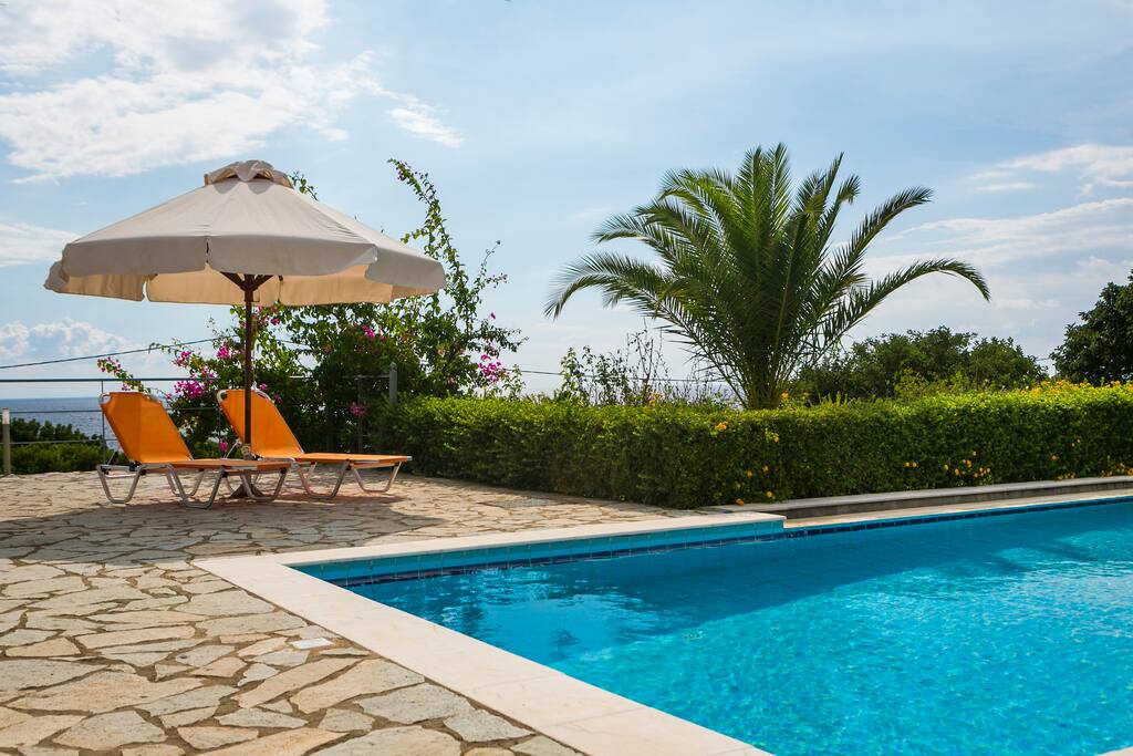 Umbrella by the Swimming pool