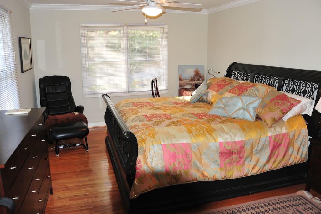 The gorgeous Master bedroom on the first floor has a king size bed, relaxing leather massage chair, and abundant storage including a walk-in closet.