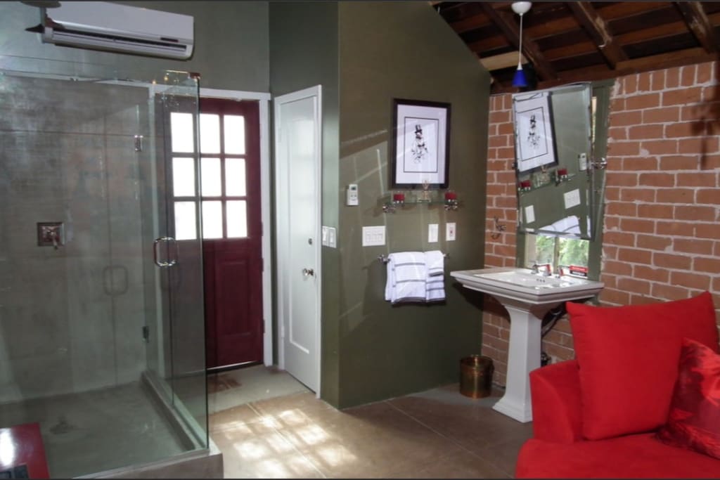 Built in rain shower for two and private loo