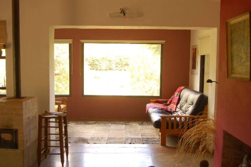 Estar comedor con tv, home Theater, cable satelital, dvd. Celfaccion, Aire acondicionado.