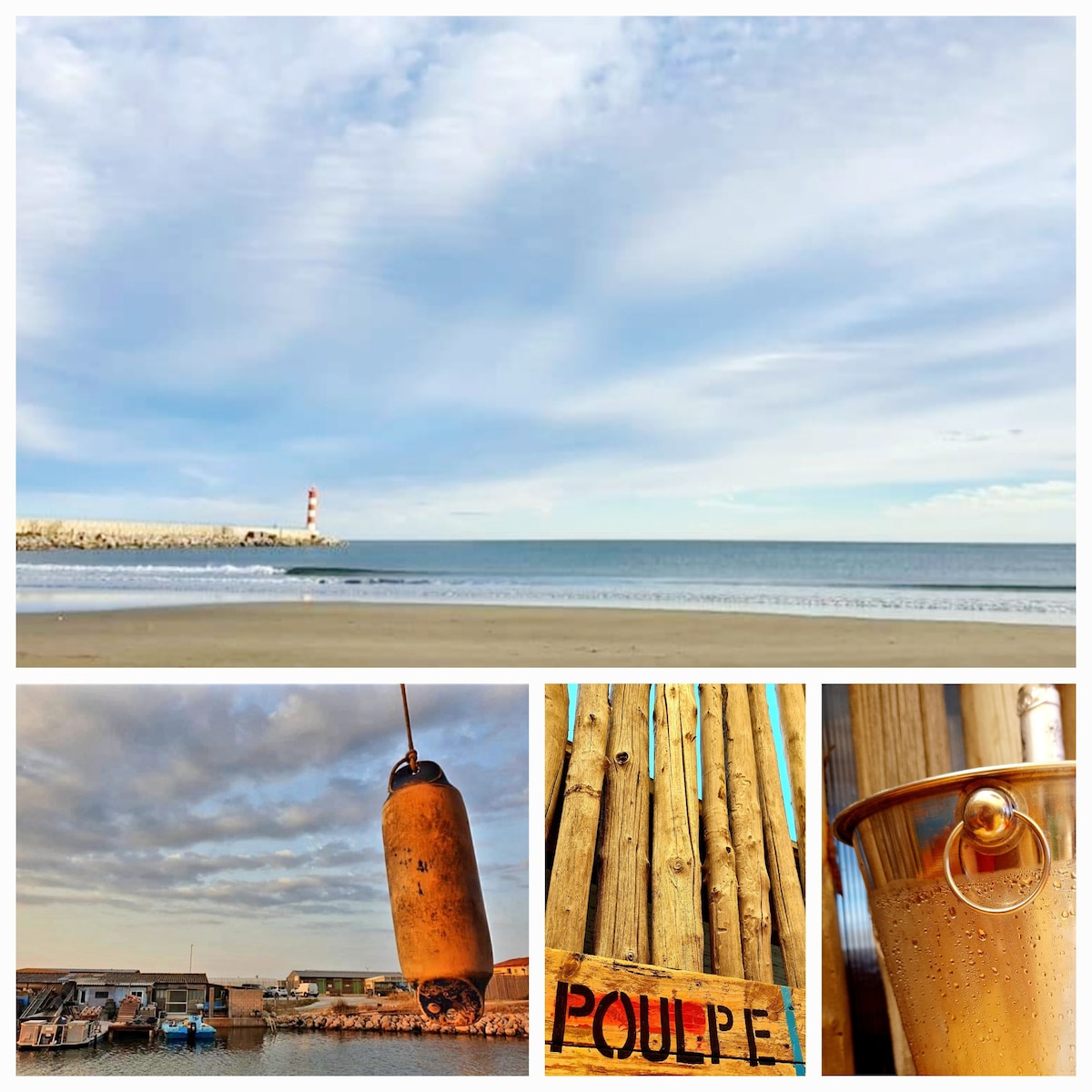 The image showcases a serene beach scene with gentle waves and a lighthouse in the distance under an expansive sky. Nearby, an orange buoy hangs against a backdrop of rustic wooden structures, adding a touch of coastal charm to the scenery.