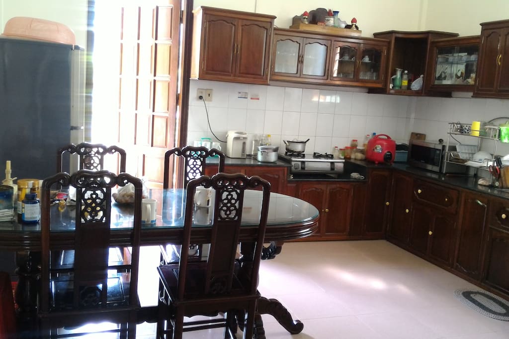 This is our large kitchen where we have 3 meals a day together. During the evening, we gather here and talk about our day. You will definitely love the coziness in our home.