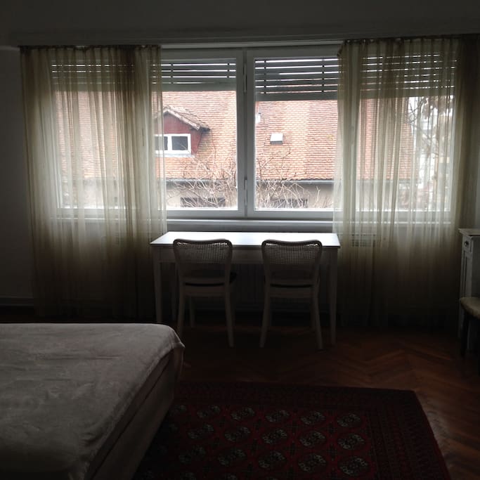 Master bedroom window view. Writing table.