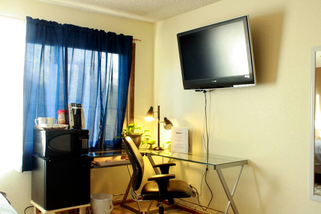 Television and Beverage/Snack Station at desk