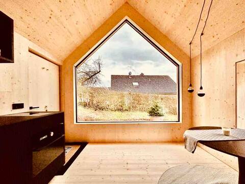 Cozy tiny house with pellet stove plus sauna