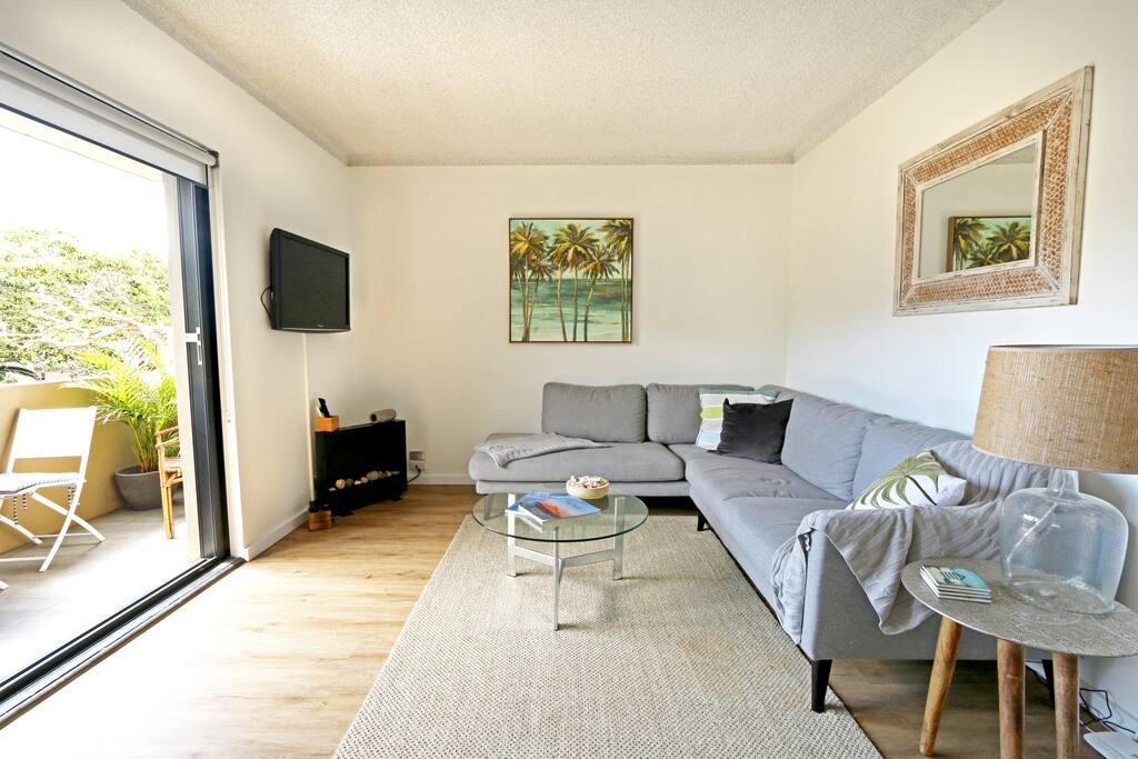 Lounge room facing onto balcony with bifold doors