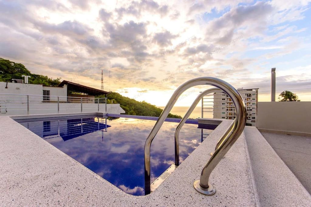 Infinity pool and sun deck with amazing views of Banderas Bay, El Centro, Zona Romantica, Marina Vallarta, and Zona Hotelra