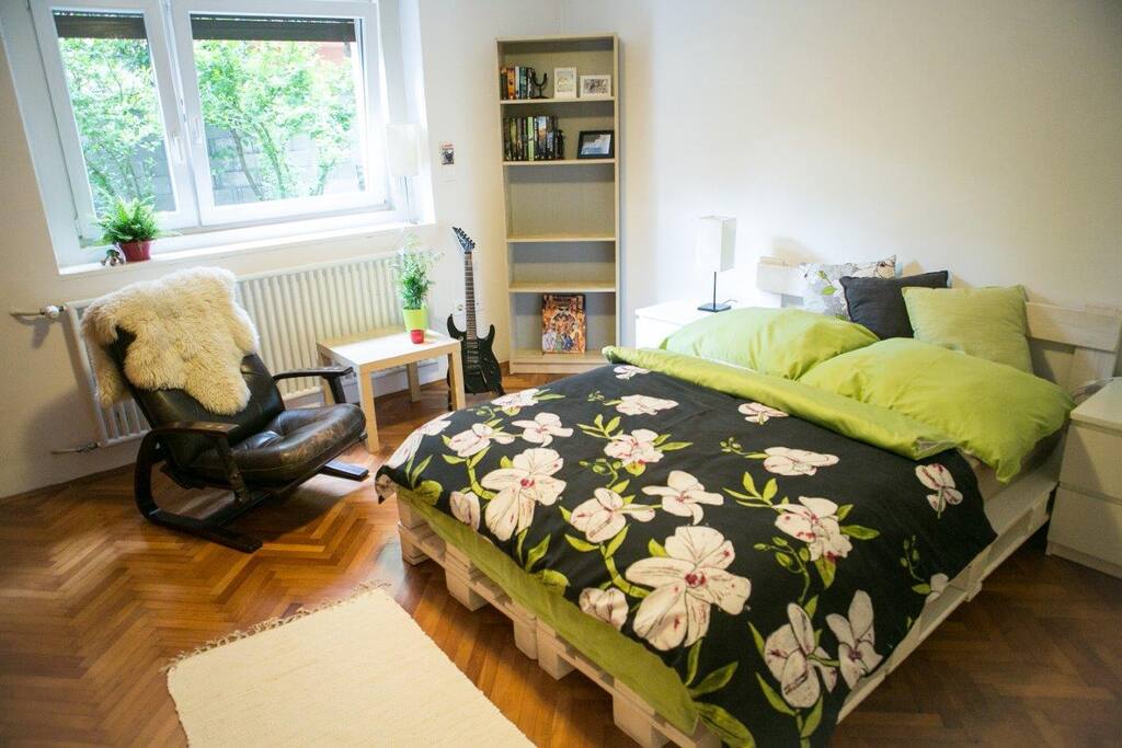 Bedroom No.1 with a handmade pallet bed. Cosy comforts.