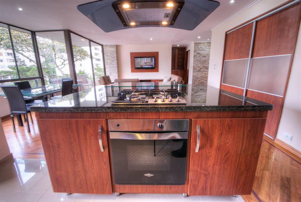 Full kitchen with stove and dishwasher