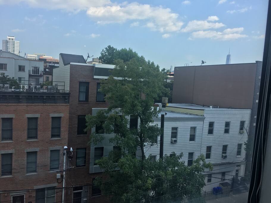 View out the big living room window (freedom tower towards the top right corner)