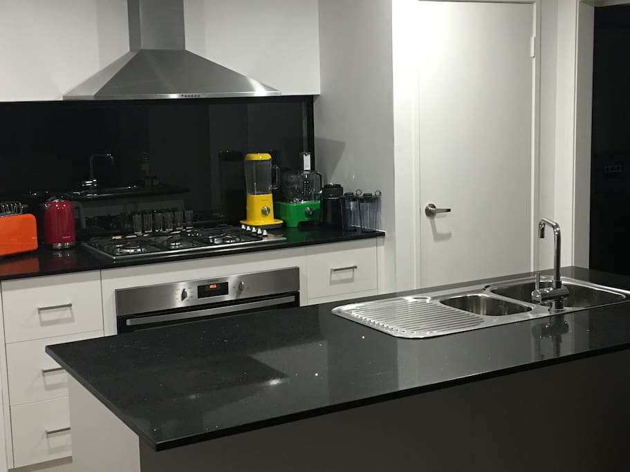 A fresh modern clean kitchen with appliances