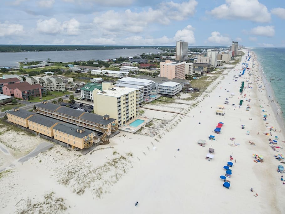 Steps from the beach, this family-friendly 2BR condo sleeps 7