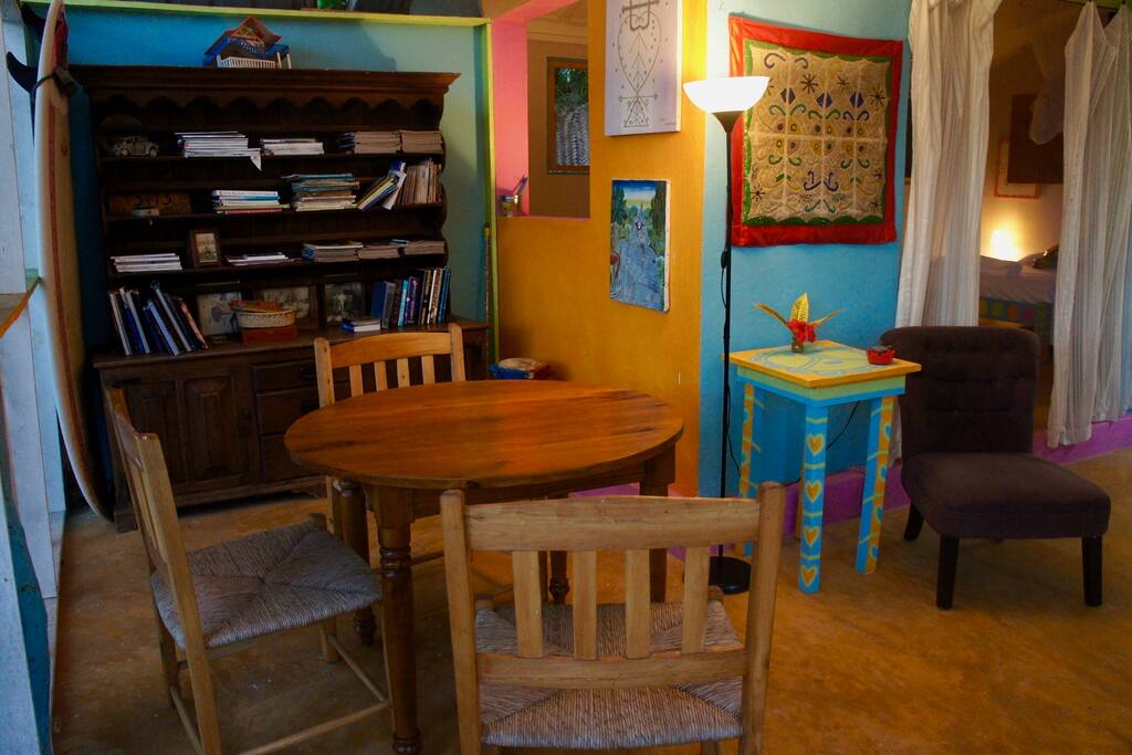 Dining/Hang out Area. Bookshelf full of all kinds of reading material.