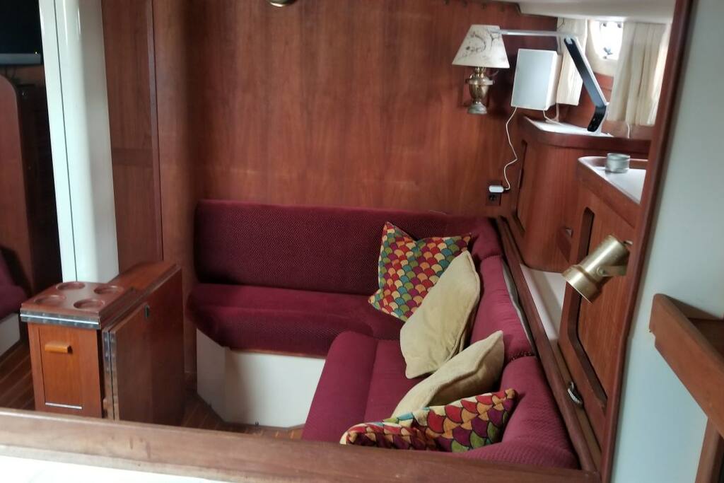 Below deck sitting area with TV