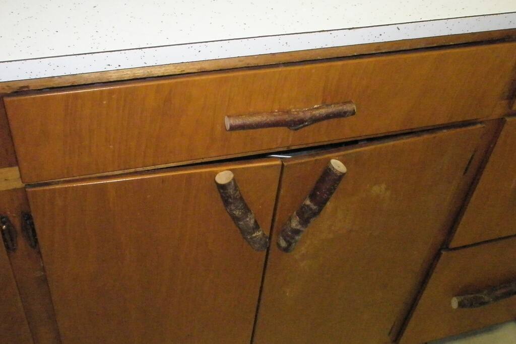 Cabinets with tree branch knobs