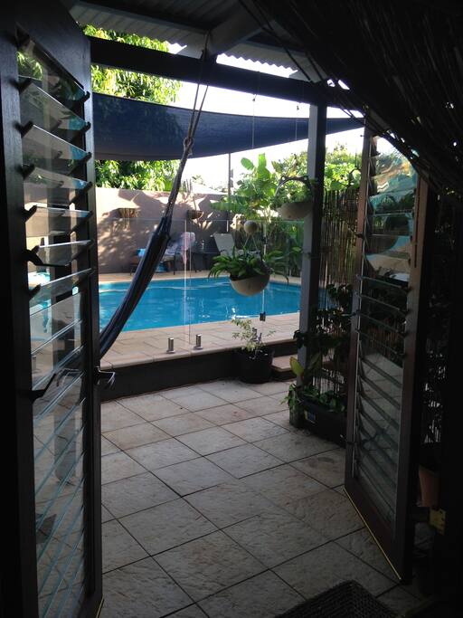 French doors opening out onto pool