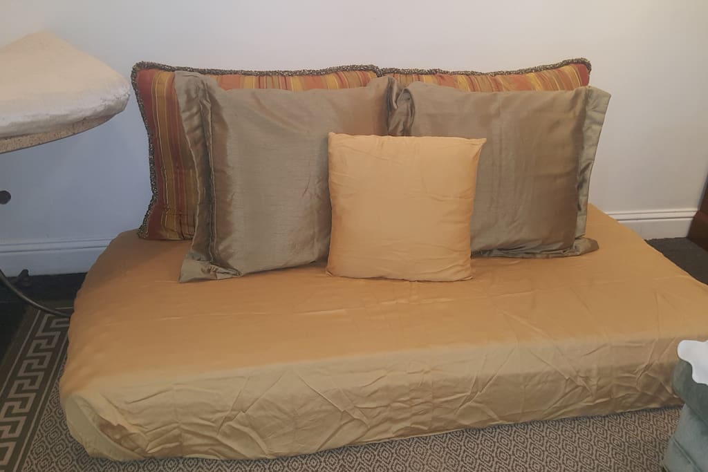 Twin bed with mattress topper
