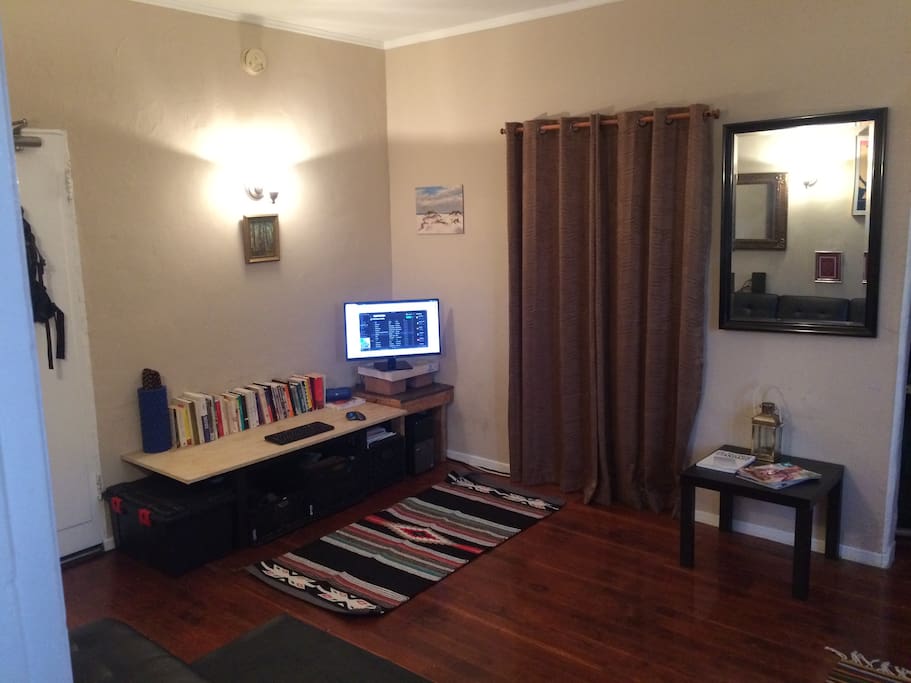 The 'bedroom' is behind the curtains