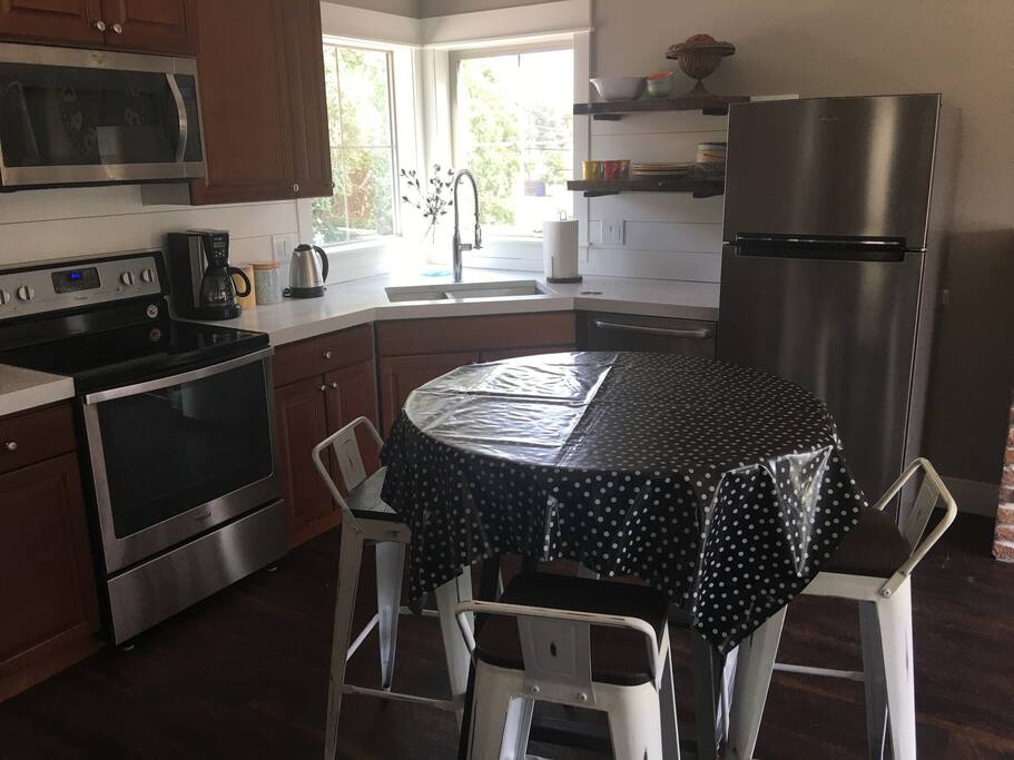 Complete kitchen with trendy white cement countertops