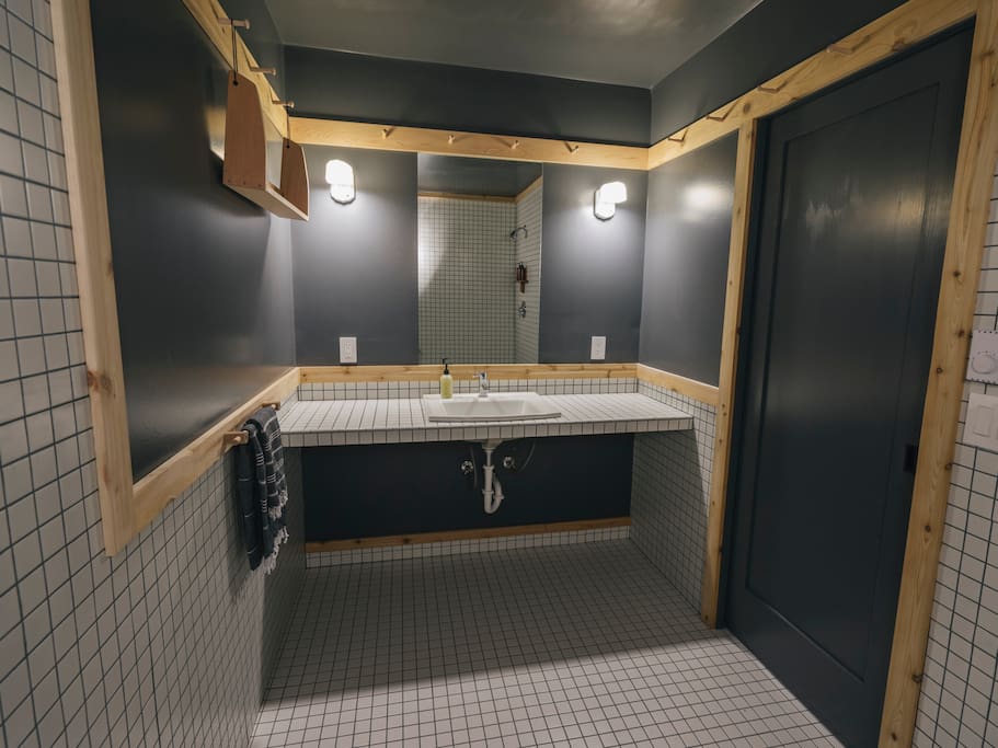 lots of tile and cedar peg rail