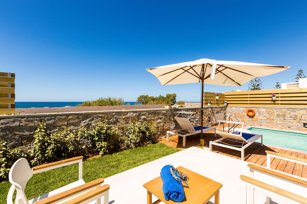 Private swimming pool area with sun beds, there is also a hot tub. (The pool can be also heated)