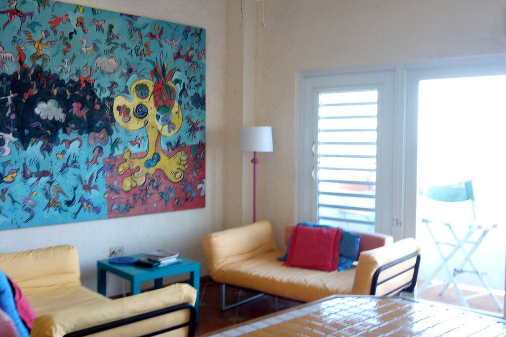 Living room with balcony and Ocean view.