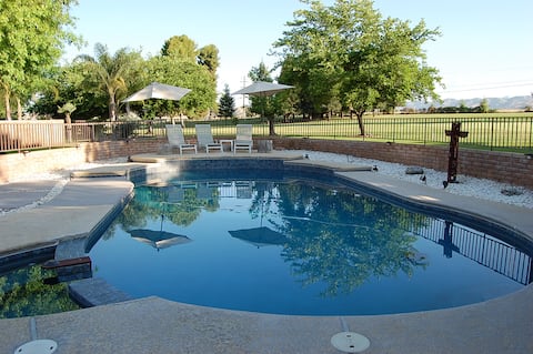 5 bedroom, 4 bath house, pool, game room and yard