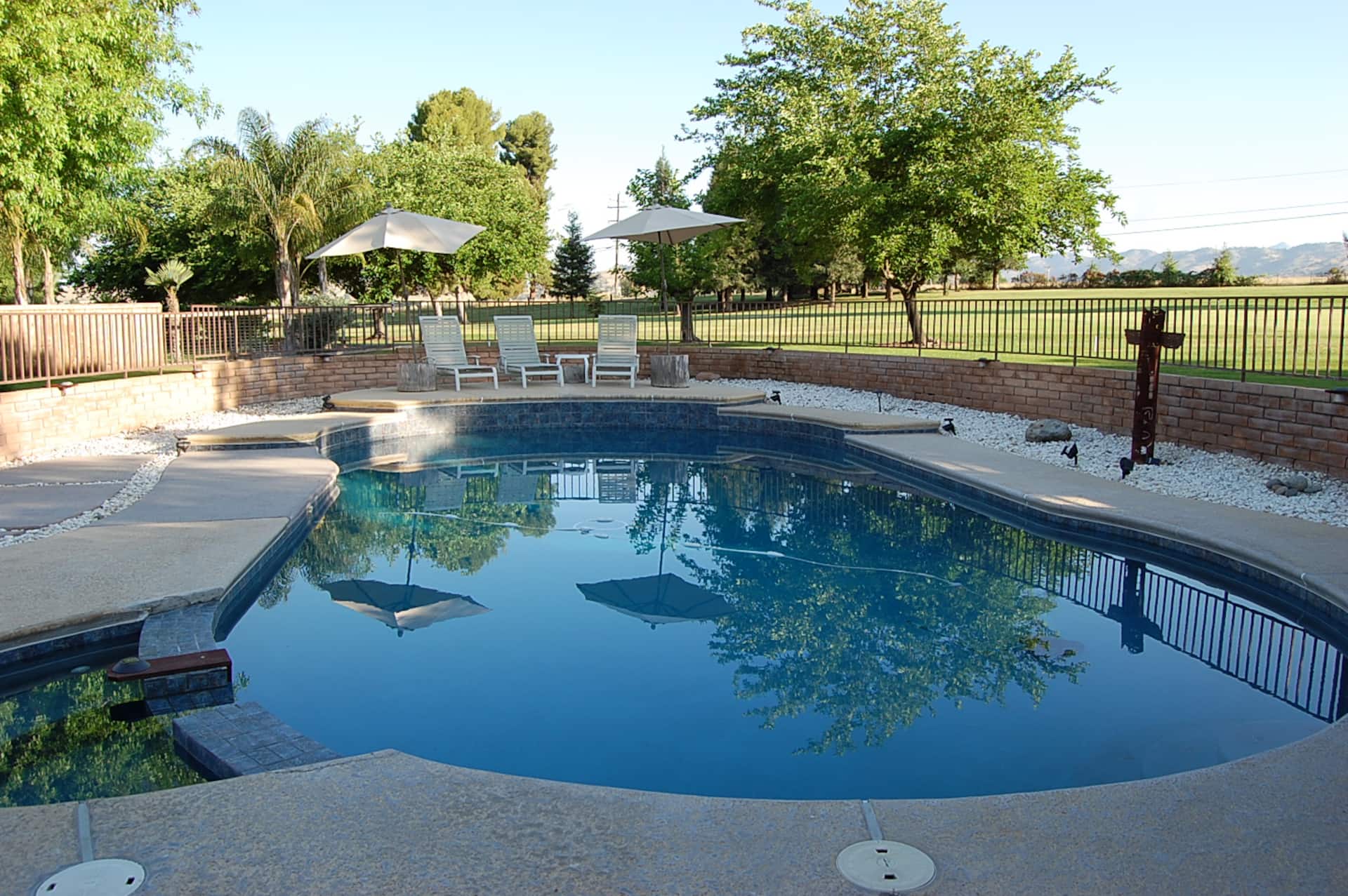 5 bedroom, 4 bath house, pool, game room and yard