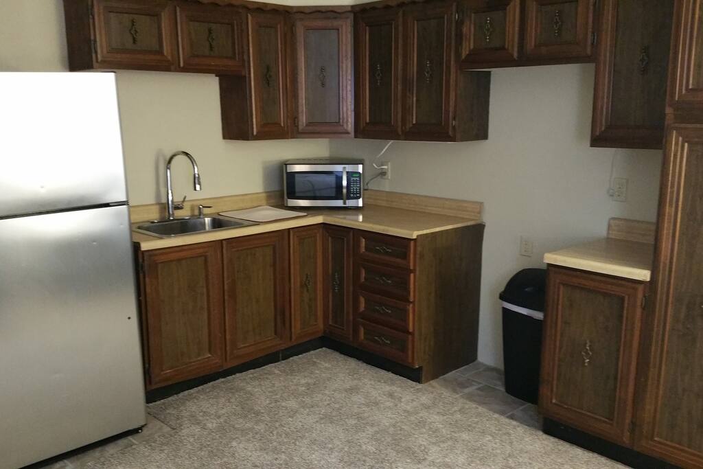 Full size fridge, New Microwave, Dishes furnished.