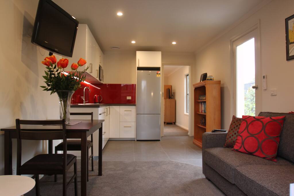 Lounge area, kitchen, through to bedroom and bathroom.