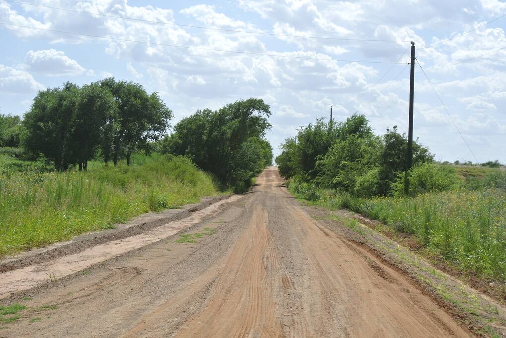 All weather gravel road to gate entrance