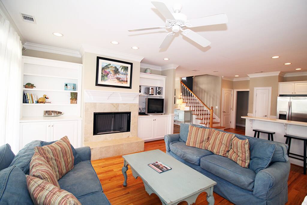 Living area with queen sleeper sofa, TV, VCR/DVD player, and stereo