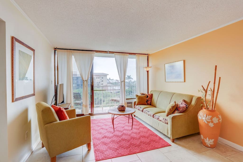 Relax in a comfortable living space that lets to outside in!