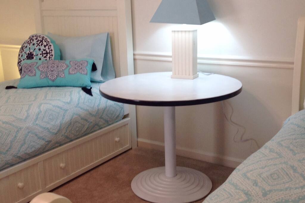 Clean and comfortable twin beds with trundle to sleep three.