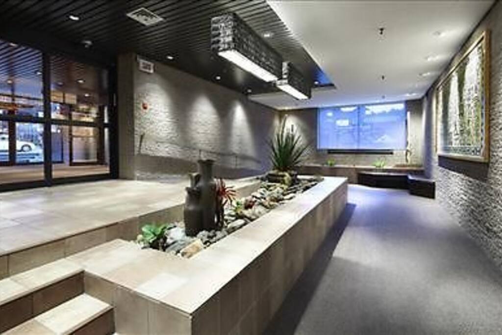 lobby lounge with free wi-fi and tv, access to underground mall by elevators.