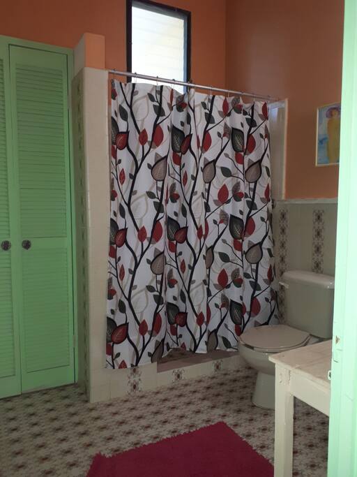 The entrance is by the nice bathroom