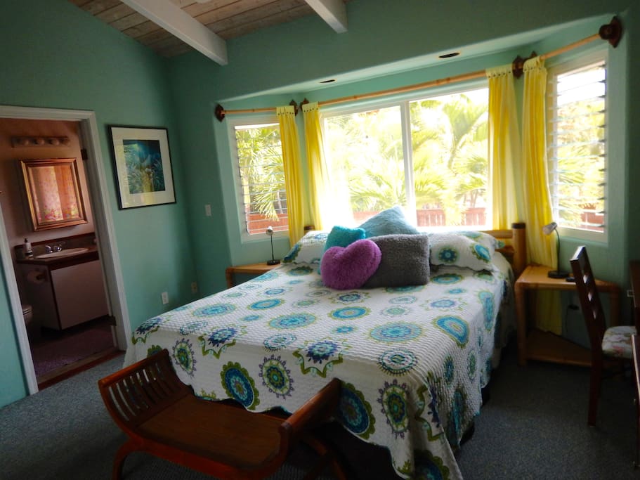 Large bedroom with Cal. King size bed and private custom full bathroom.