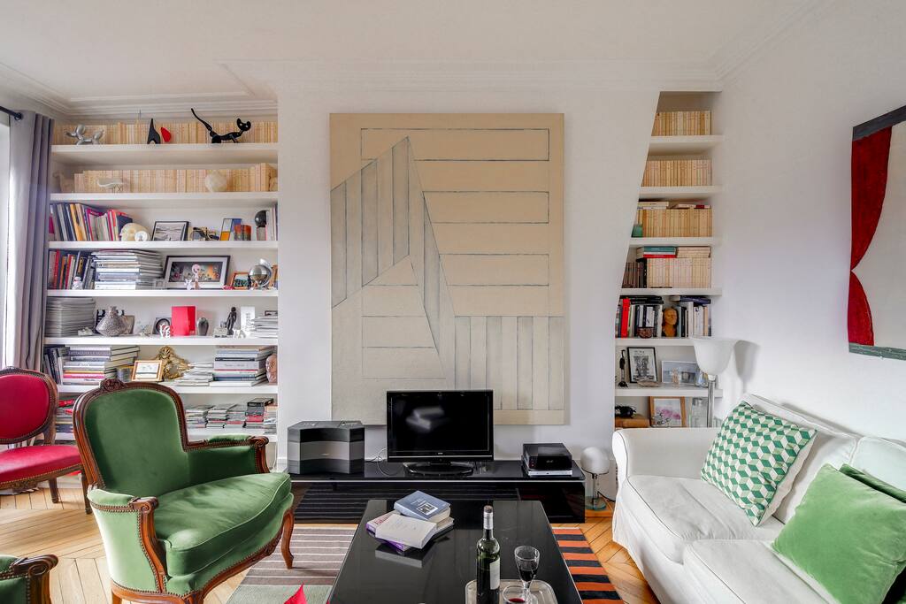 Bookshelves, TV and comfy couch