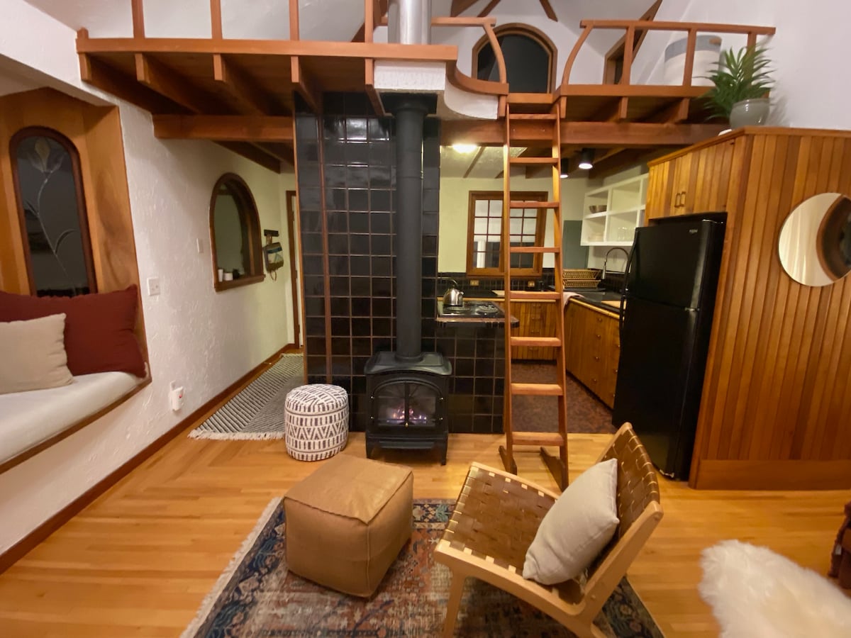 Open concept studio, with reading loft. Mahogany woodwork throughout.