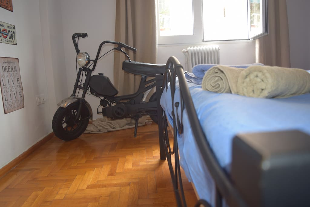Oldfashioned mini motorbike.
