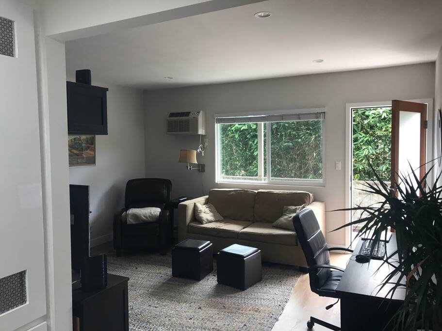 Living room with great natural light and garden views