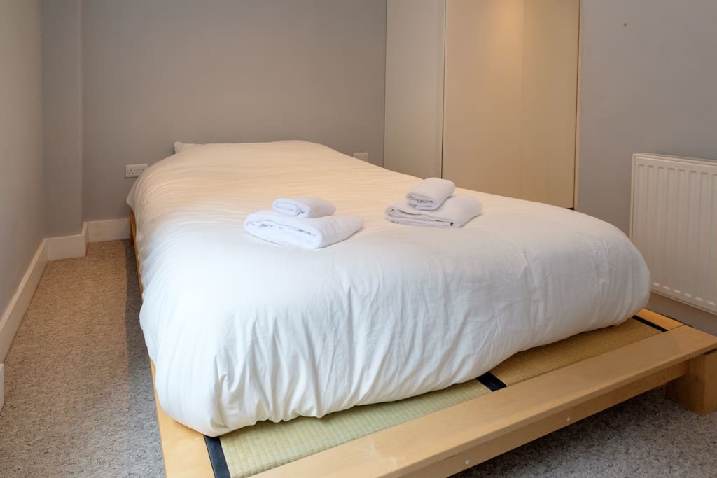 The main bedroom with a king size bed