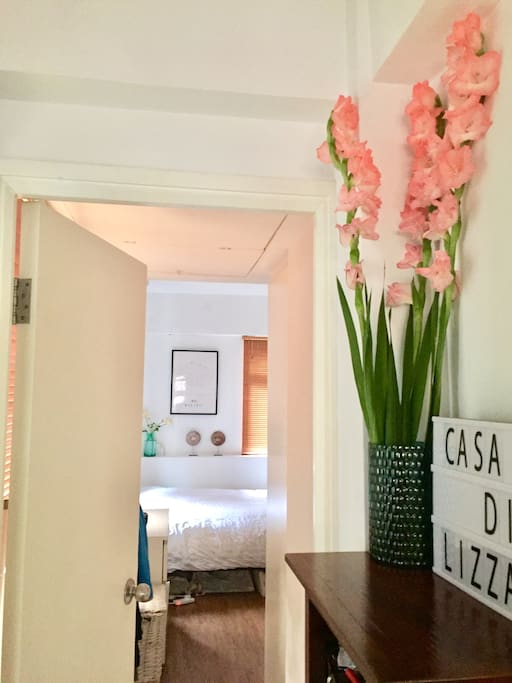 Hallway to bathroom and bedroom