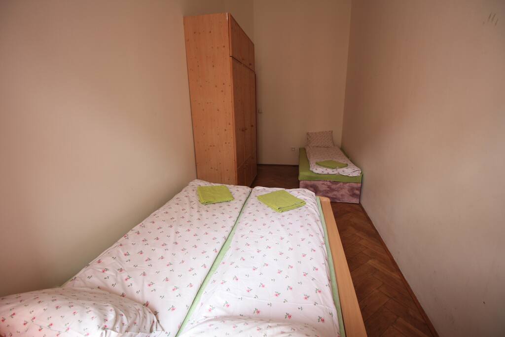 Your private bedroom 12A2, 3 beds ,wardrobe , chair access to kitchen and bathroom